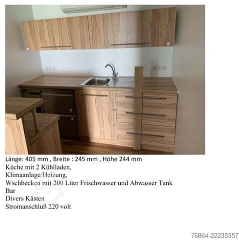 Dobozos félpótkocsi  K.M.A HOLLAND KM02 KG, VERKAUFSKOFFER MIT KüCHE,  RECHTS TERRASSE AUSKLAPPBAR, SHOWTRAILER