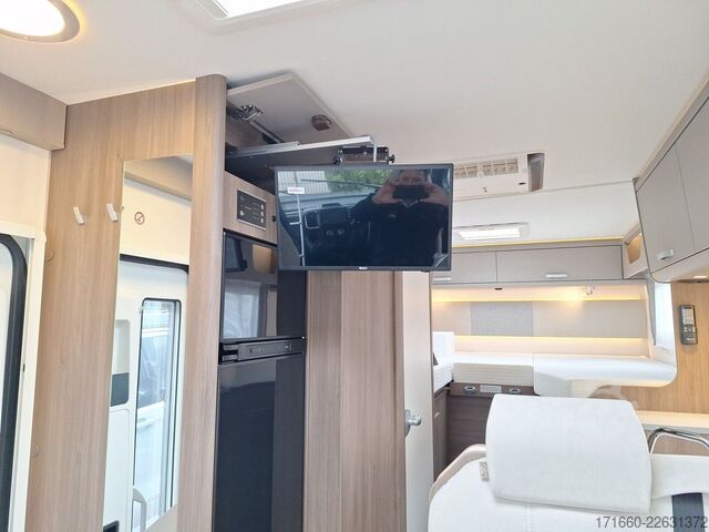 Integriertes Wohnmobil CARADO pro+ I 338 Dachklima, Automatik, TV-Paket