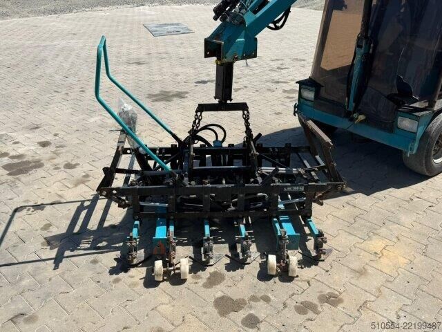 เครื่องจักรก่อสร้าง Andere Optimas H77 / Pflasterverlegemaschine