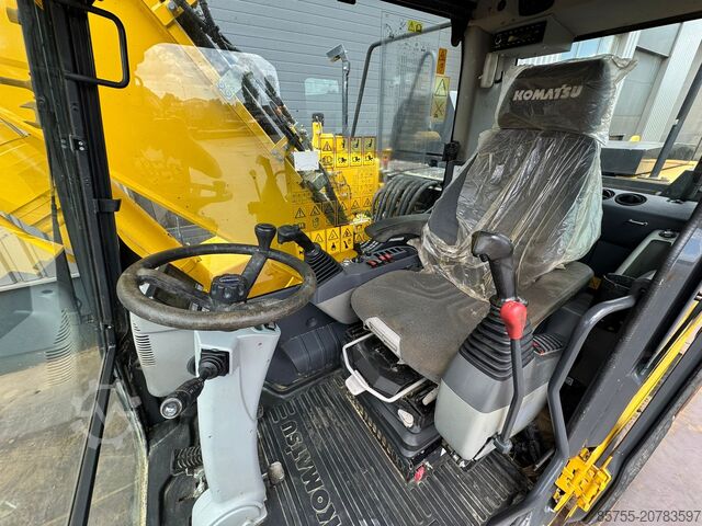 Riteņu ekskavators Komatsu PW180-11