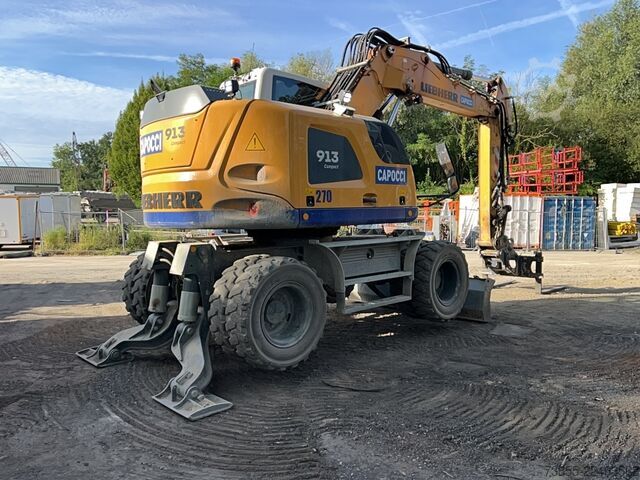 Escavadora sobre rodas Liebherr A913 Compact Litronic with 3 excavator buckets