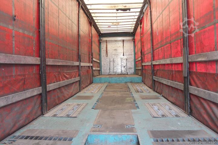 Gjysmë rimorkio e ulët për transportin e makinerive të ndërtimit Meusburger carrellone centinato buche 4assi usato