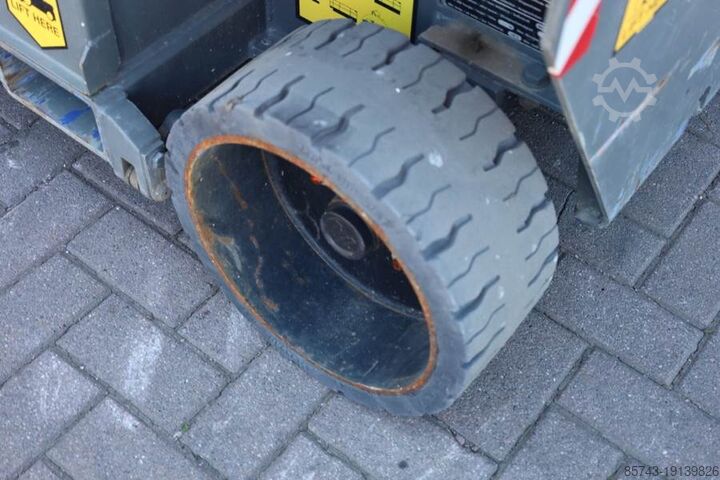 Saksinostin Holland Lift Ecostar HL-9710 Electric, 12m Working Height, 325k