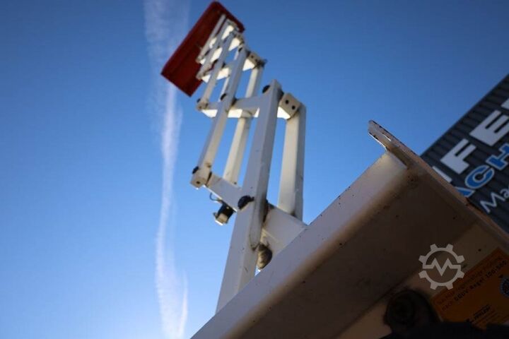 Scissor lift Holland Lift Ecostar HL-9710 Electric, 12m Working Height, 325k